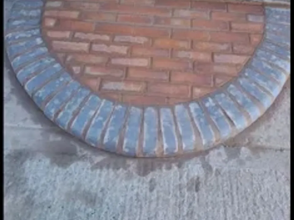 A neat brick arch detail in fresh red brickwork