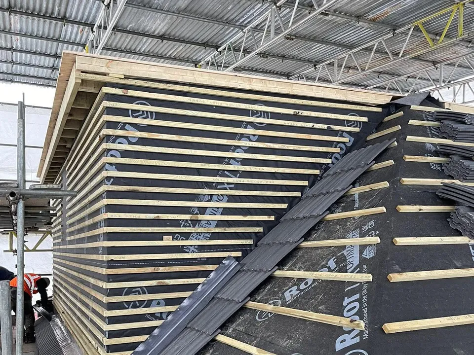New roof structure with timbers, breathable membrane and scaffolding